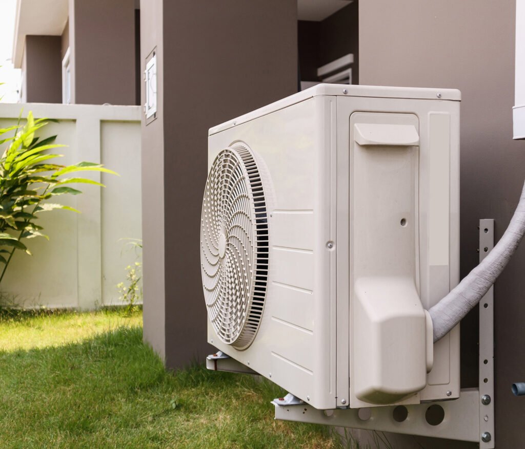 air conditioner compressor outdoor unit installed outside house e1771096318469